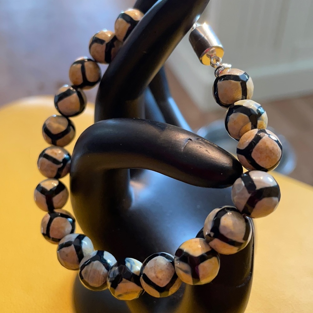 Gorgeous ivory and black tribal beads. Very $$$